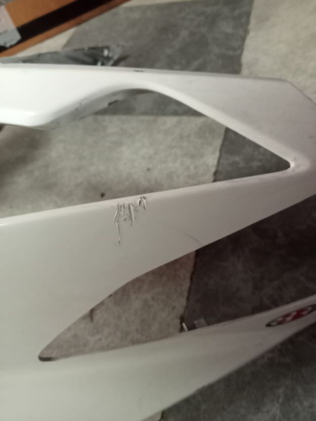 Frontal y Cacha Kymco Super Dink 125 (2011)