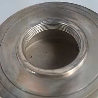 Antico fornellino a petrolio in metallo argentato