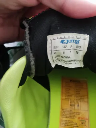 Botas de fútbol Joma negras y verdes