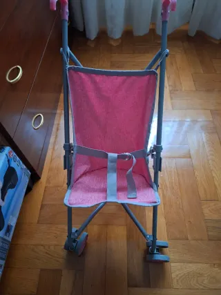 Carrito de muñecas rosa