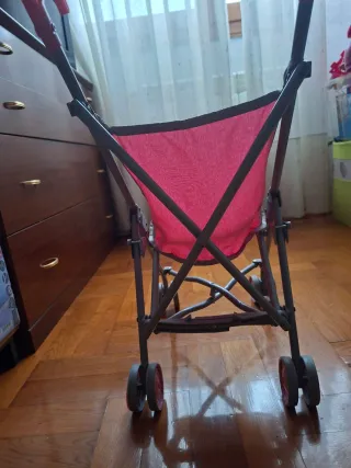 Carrito de muñecas rosa