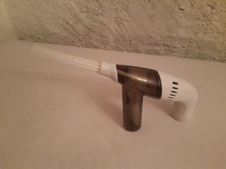 Mini aspiradora de mano