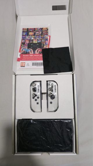 Nintendo Switch OLED Bianca + Super Mario Bros. Wo