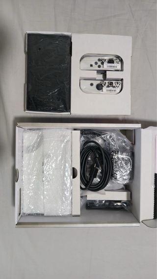 Nintendo Switch OLED Bianca + Super Mario Bros. Wo