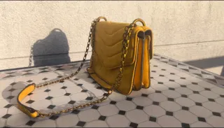 Bolso acolchado con abeja