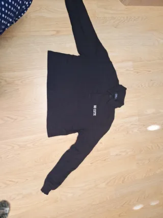 Camiseta ancha negra con texto