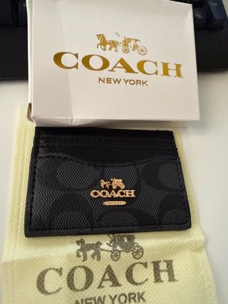 Porta cartões Coach preto e dourado