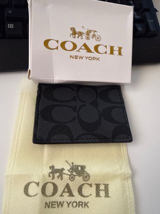 Porta cartões Coach preto e dourado