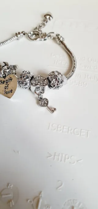Bracciale charms con ciondoli