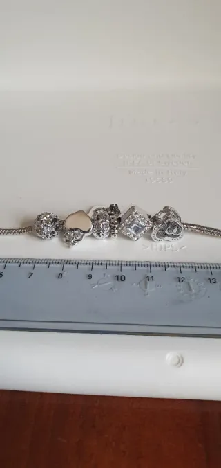 Bracciale charms con ciondoli