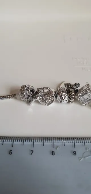 Bracciale charms con ciondoli