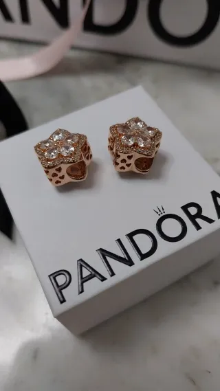 Charm Pandora Copo de nieve oro rosa.