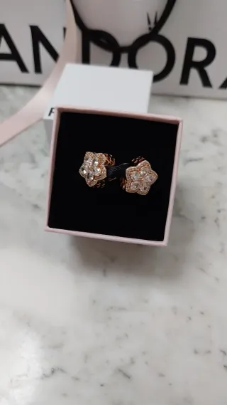 Charm Pandora Copo de nieve oro rosa.