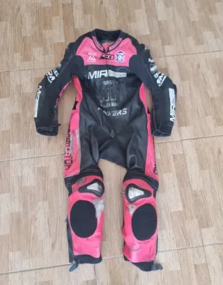 Mono de moto Talla 14 rosa y negro