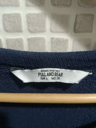 Jersey Pull&Bear azul marino con bolsillos