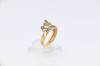 ANILLO GRANDE CORONA 15 CIRCONITAS AZULES. Oro 18k