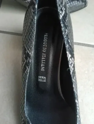 Décolleté in vera pelle pitonata