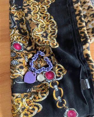 Sciarpa fantasia con stampa animalier e dettagli