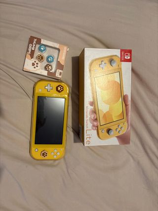 Nintendo Switch Lite Giallo + Accessori