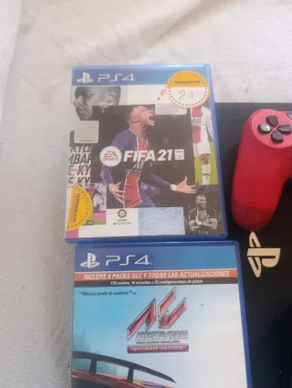 PS4 1TB con 2 mandos y 2 juegos y base de carga