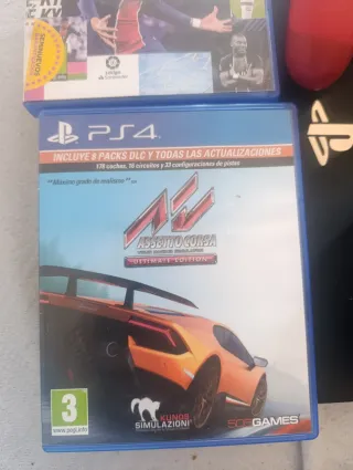 PS4 1TB con 2 mandos y 2 juegos y base de carga