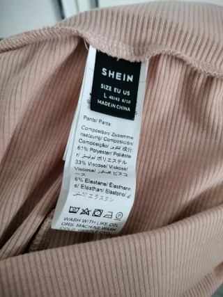 Pantalón acampanado rosa palo