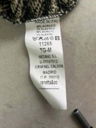 Guardapolvo sin mangas rayas negras y beige