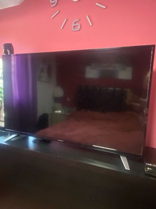 Televisor Negro y Plateado 55”