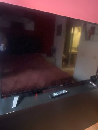 Televisor Negro y Plateado 55”