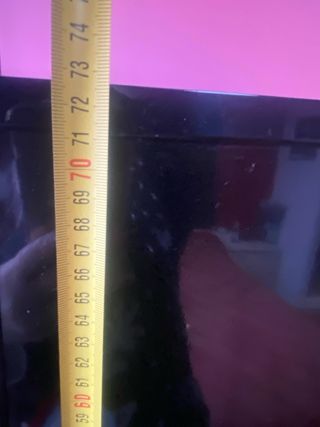 Televisor Negro y Plateado 55”