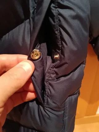 Chaqueta de niño Nike Therma-Fit con capucha.