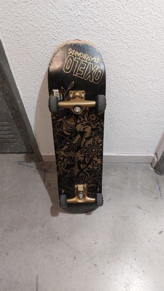 Skate OXELO Negro Dorado
