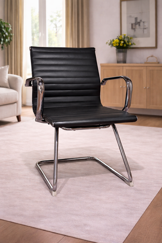 Silla confidente piel negra y cromado