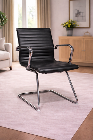 Silla confidente piel negra y cromado