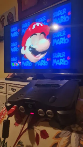 Nintendo 64 con 2 mandos y juegos