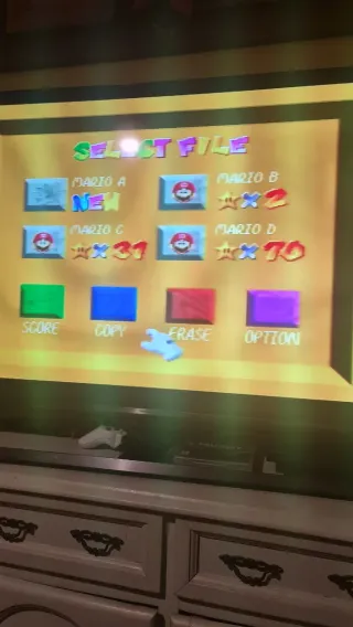 Nintendo 64 con 2 mandos y juegos