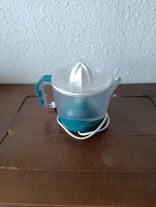 Exprimidor eléctrico
