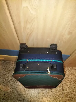 Juego de maletas y bolso de viaje