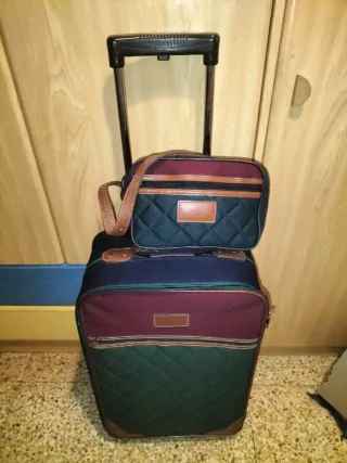 Juego de maletas y bolso de viaje