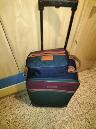 Juego de maletas y bolso de viaje