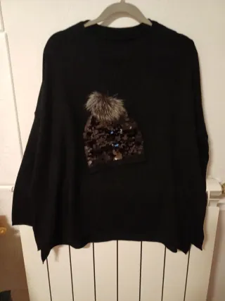 Maglia con fantasia di pailletts e ecopelliccia