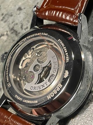 Reloj Mod Orient Automático Open Heart Marrón