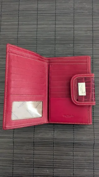 Cartera de mano Guy Laroche granate.