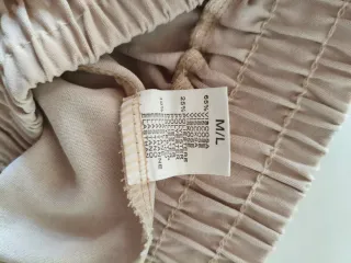 Pantalones largos mujer beige