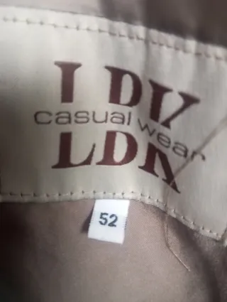 Abrigo talla 52 con cuello de pelo