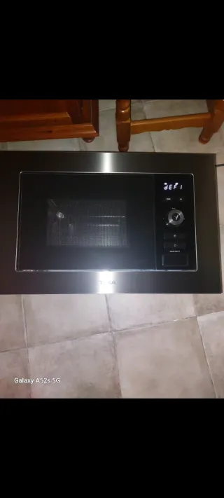 Microondas integrable Teka averiado