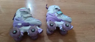 Patines niña 4 ruedas morados. Talla xs 23-26.