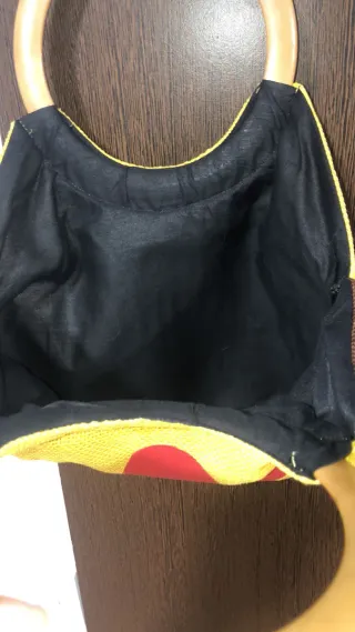 Bolso de mano con flor