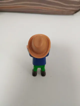 Playmobil niño vaquero sombrero azul/verde