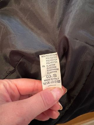 Americana negra con brillo